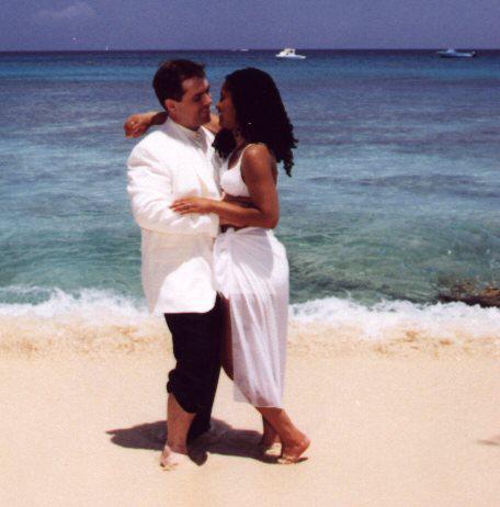 Michelle and Dan in love on the beach in Barbados